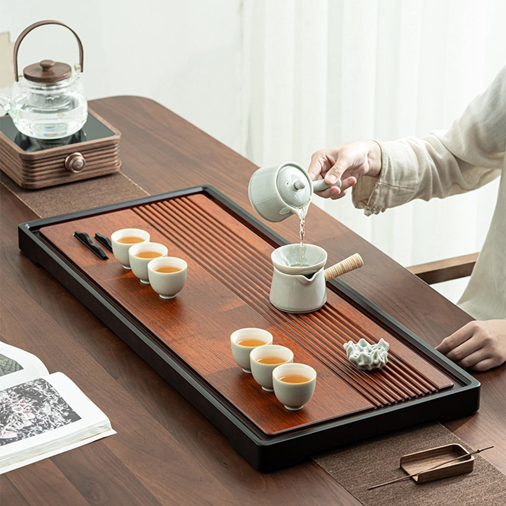 Decorative mountain design on the bamboo tea tray, highlighting craftsmanship