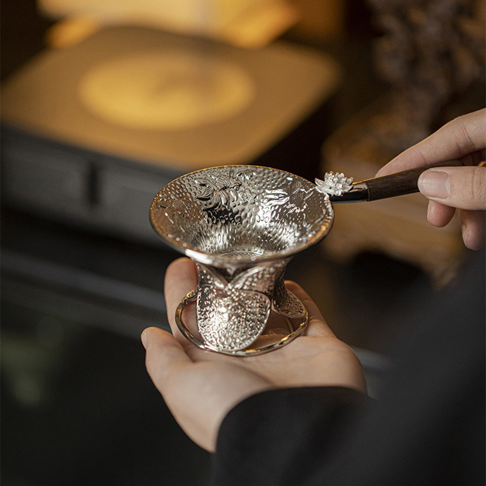 Close-up of the alloy tea strainer showcasing detailed design