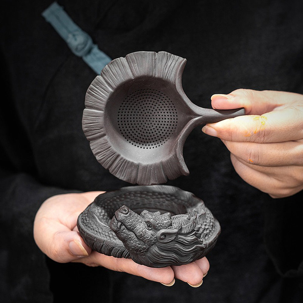 Close-up of the dragon purple clay tea strainer showcasing intricate details and craftsmanship.