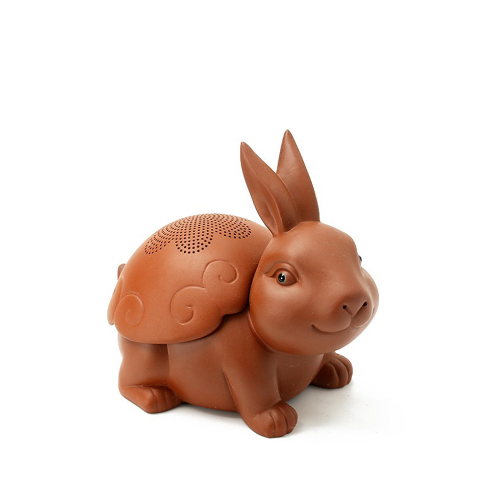 Handcrafted purple clay rabbit tea pet strainer with bright eyes and detailed features