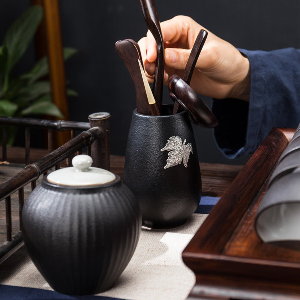 Tea set arranged on a wooden table for elegant tea ceremony presentation