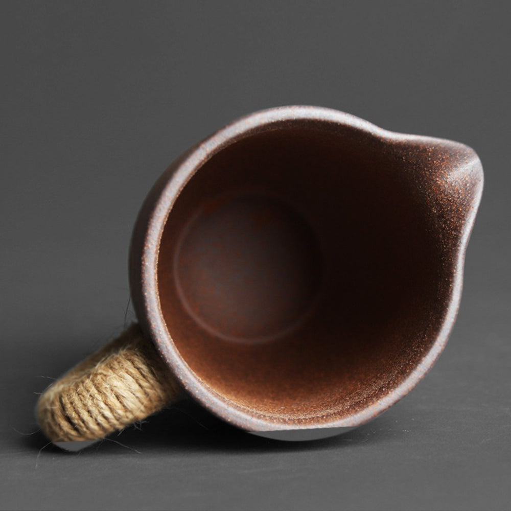 Close-up of the unique texture of the handmade pottery fair cup.