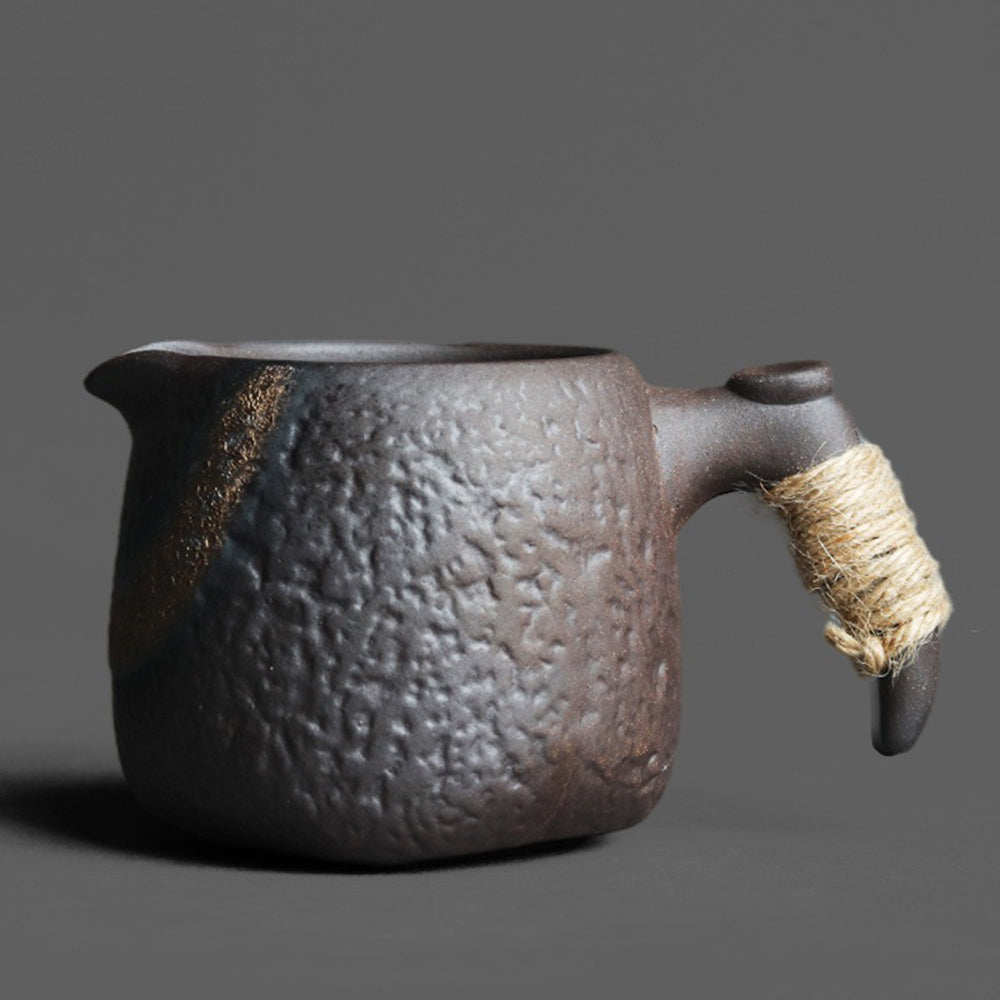 Close-up of Japanese stone texture rock fair cup showing metallic surface