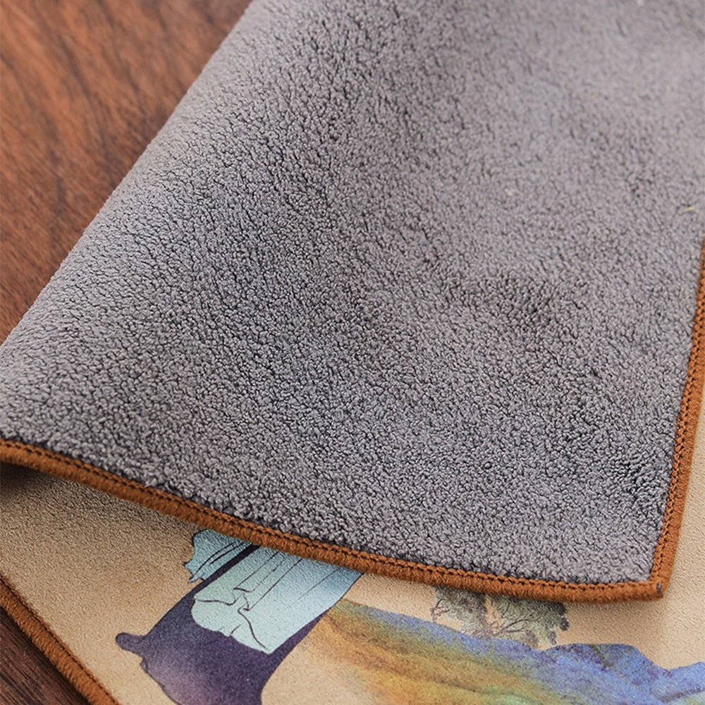 Close-up of velvet tea table mat with intricate Chinese painting design