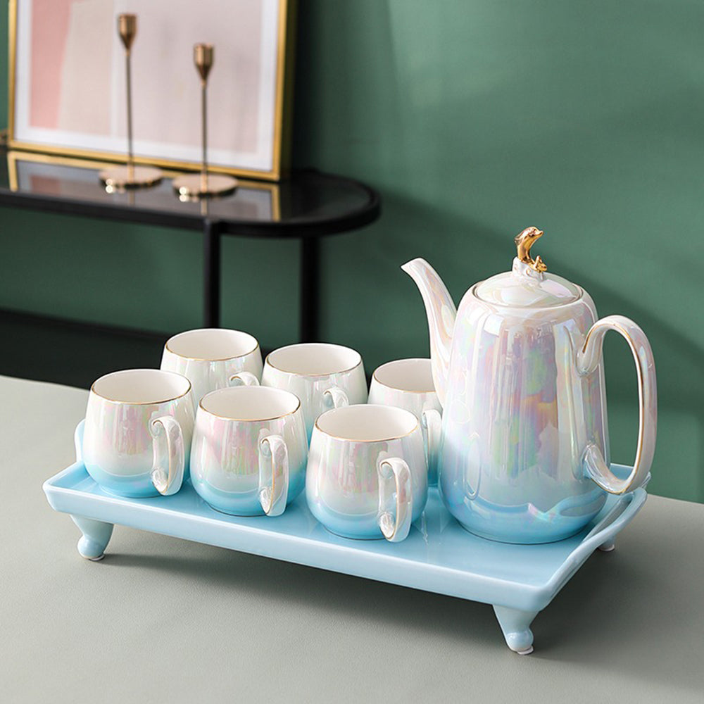 Gradient blue ceramic tea set with a smooth finish, perfect for serving tea and coffee.