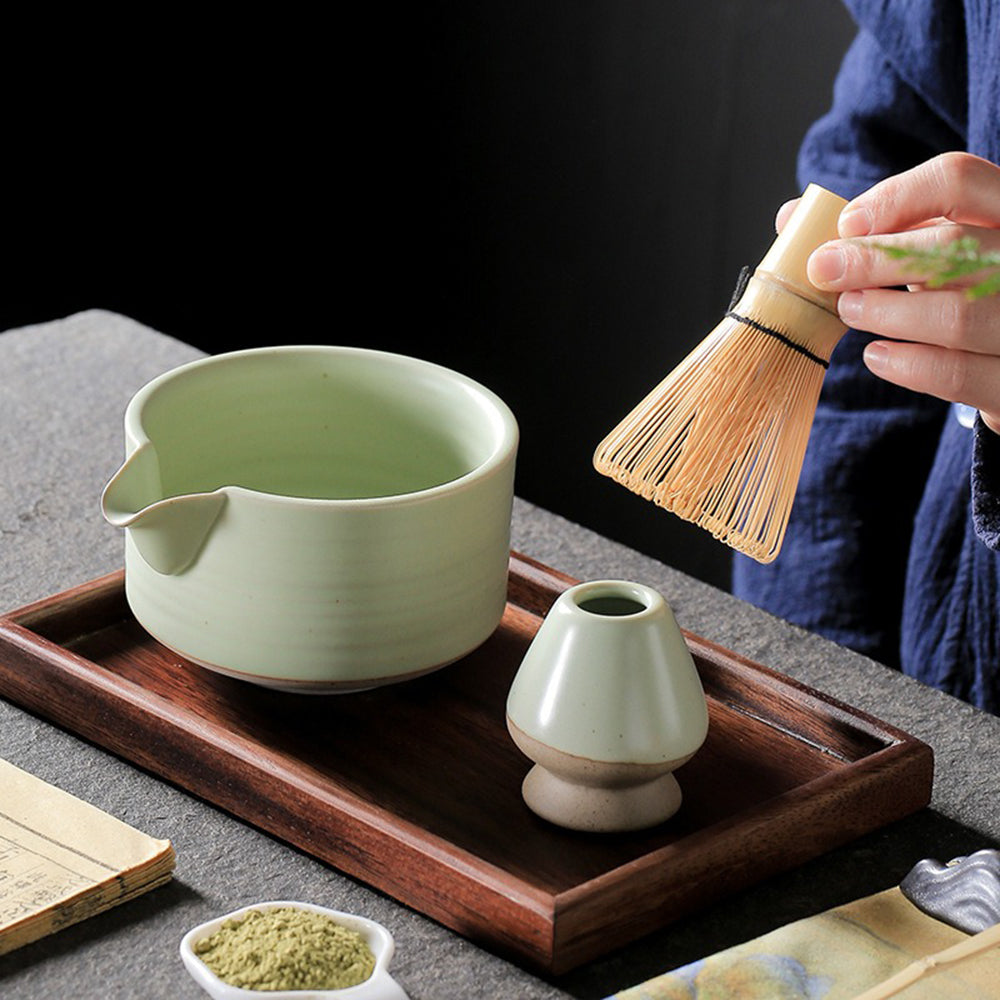 Complete matcha tea set showcasing the bamboo whisk and ceramic bowl, ideal for beginners.
