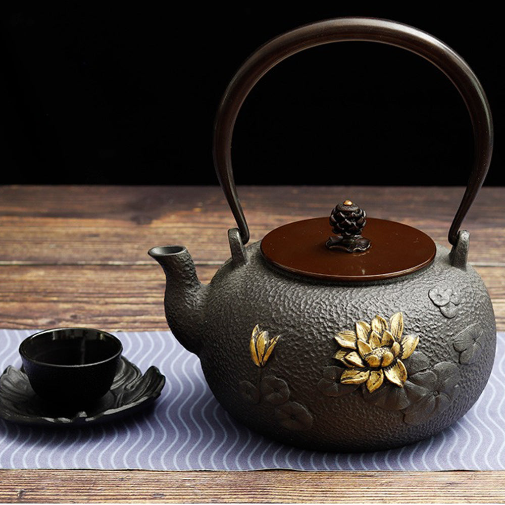 Side angle of cast iron teapot on gas stove, highlighting its sturdy build and clean spout