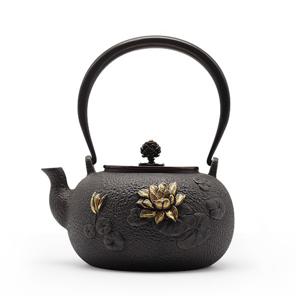 Close-up of handmade lotus iron teapot for sale, showcasing the gold-plated lotus pattern
