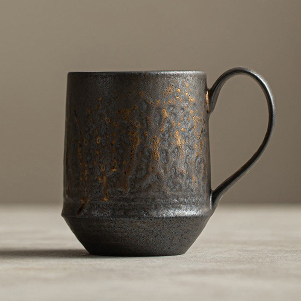 Tokoname-yaki tea cup with a rustic design, perfect for hot tea.
