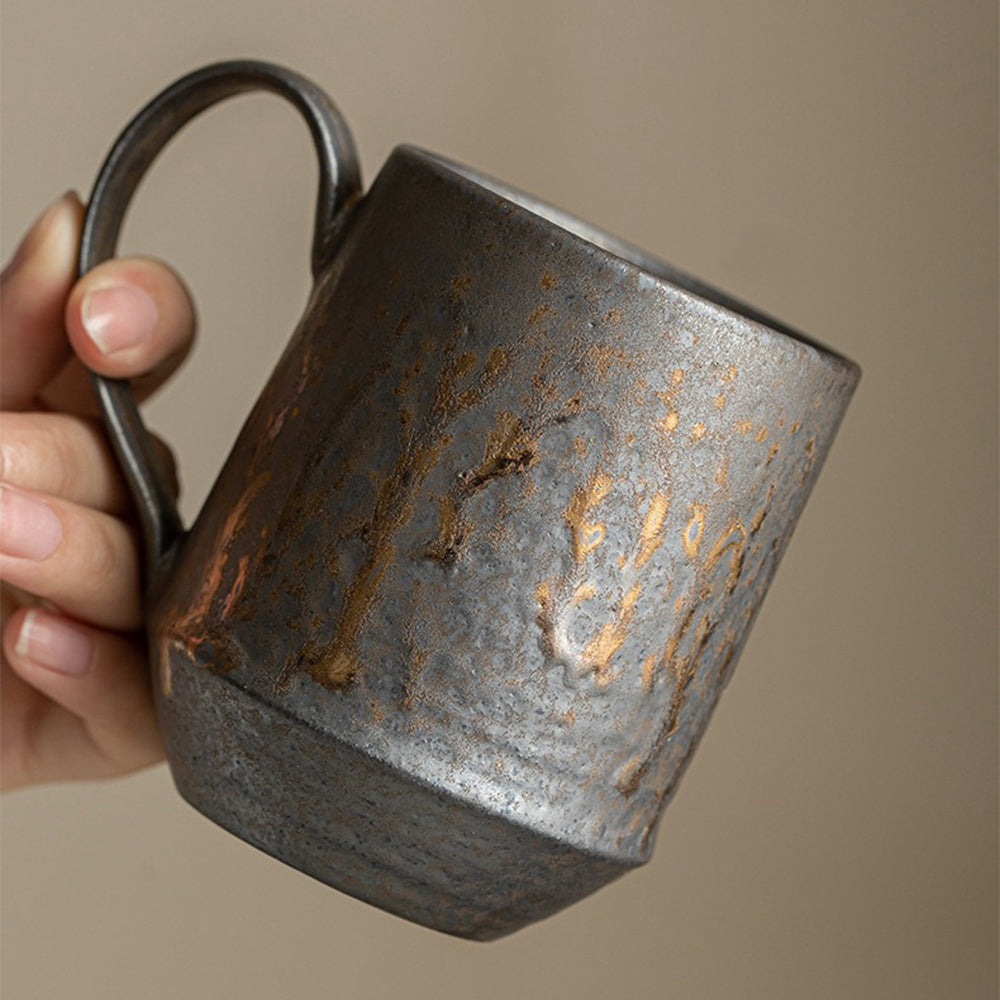 Close-up of the Tokoname-yaki tea cup highlighting its smooth curves and comfortable grip.