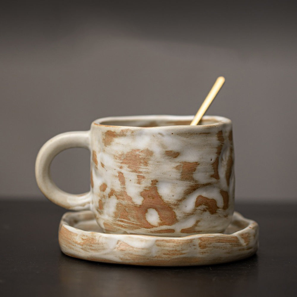 Close-up of the milky white Tokoname-yaki mug highlighting its craftsmanship and unique glaze.