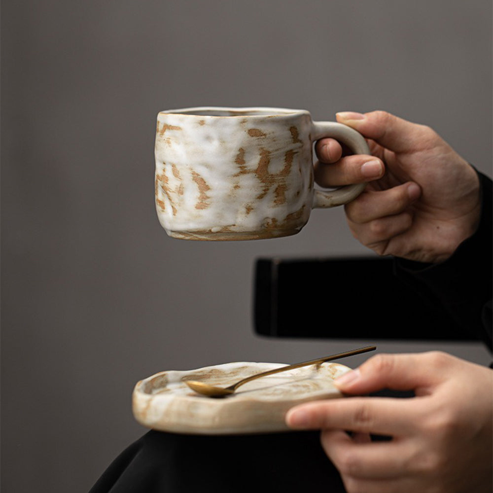 Close-up of the milky white Tokoname-yaki mug highlighting its craftsmanship and unique glaze.