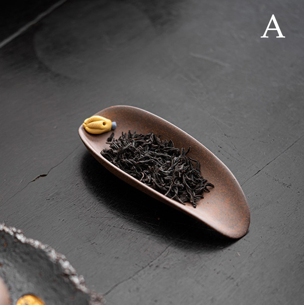 Buddhas Hand style clay tea holder with incense base functionality.