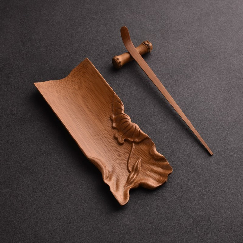 Bamboo tea holder showcasing dry tea leaves for Kung Fu tea ceremony