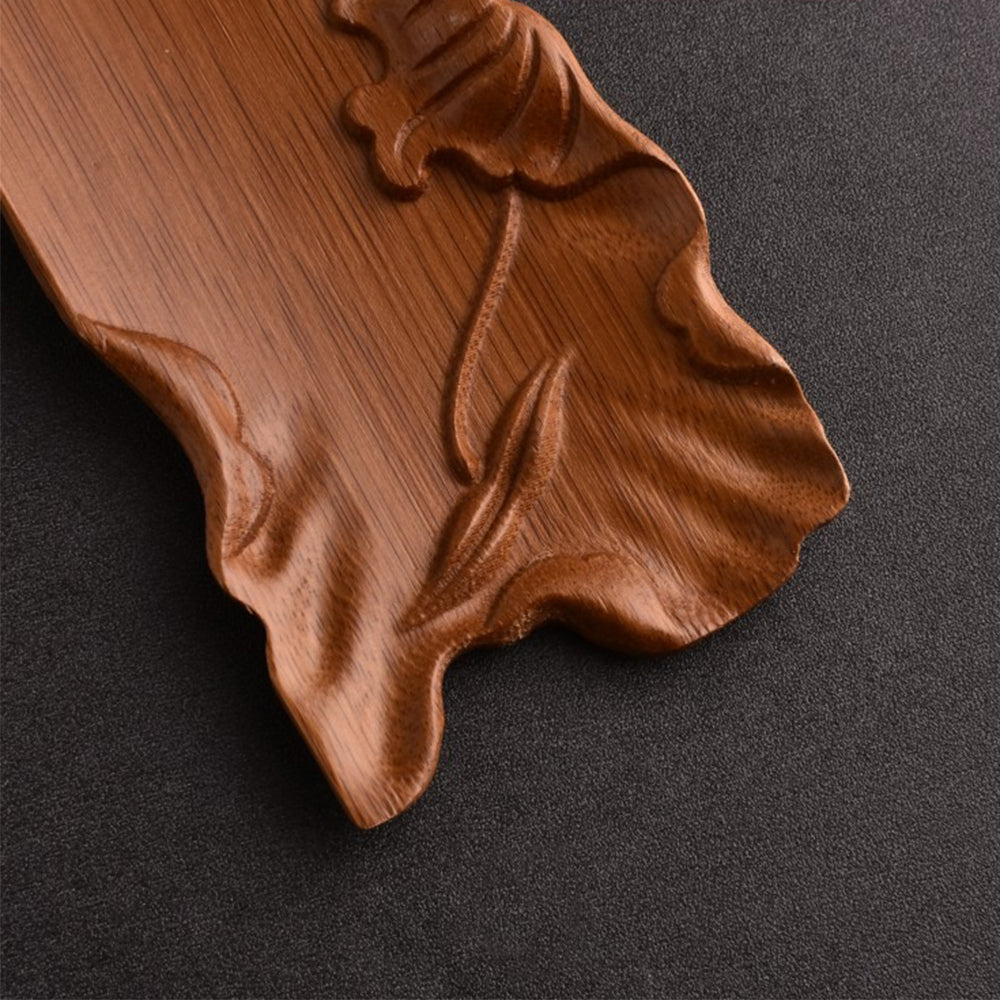 Bamboo tea holder showcasing dry tea leaves for Kung Fu tea ceremony