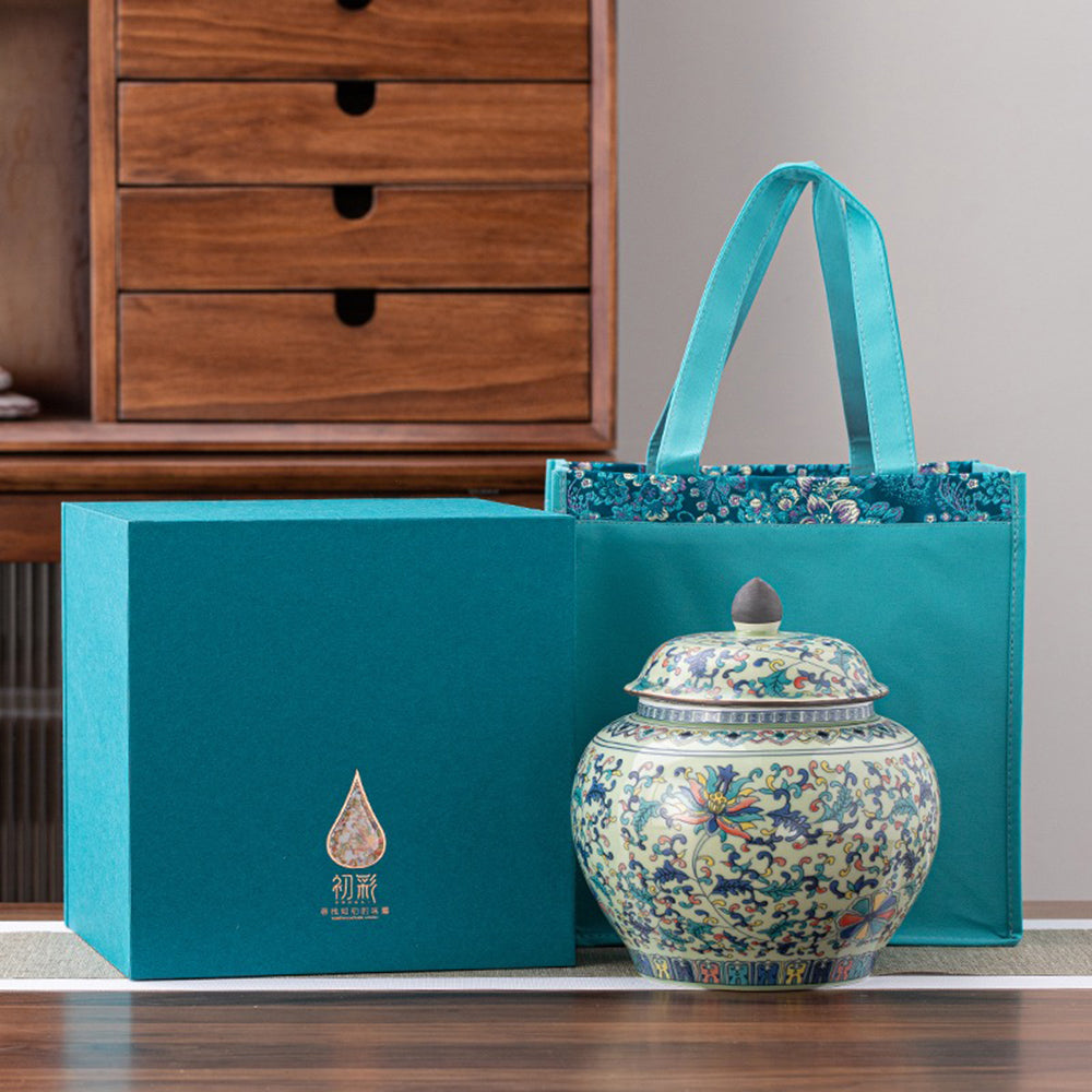 Side view of the blue and white porcelain tea caddy showcasing its intricate patterns.