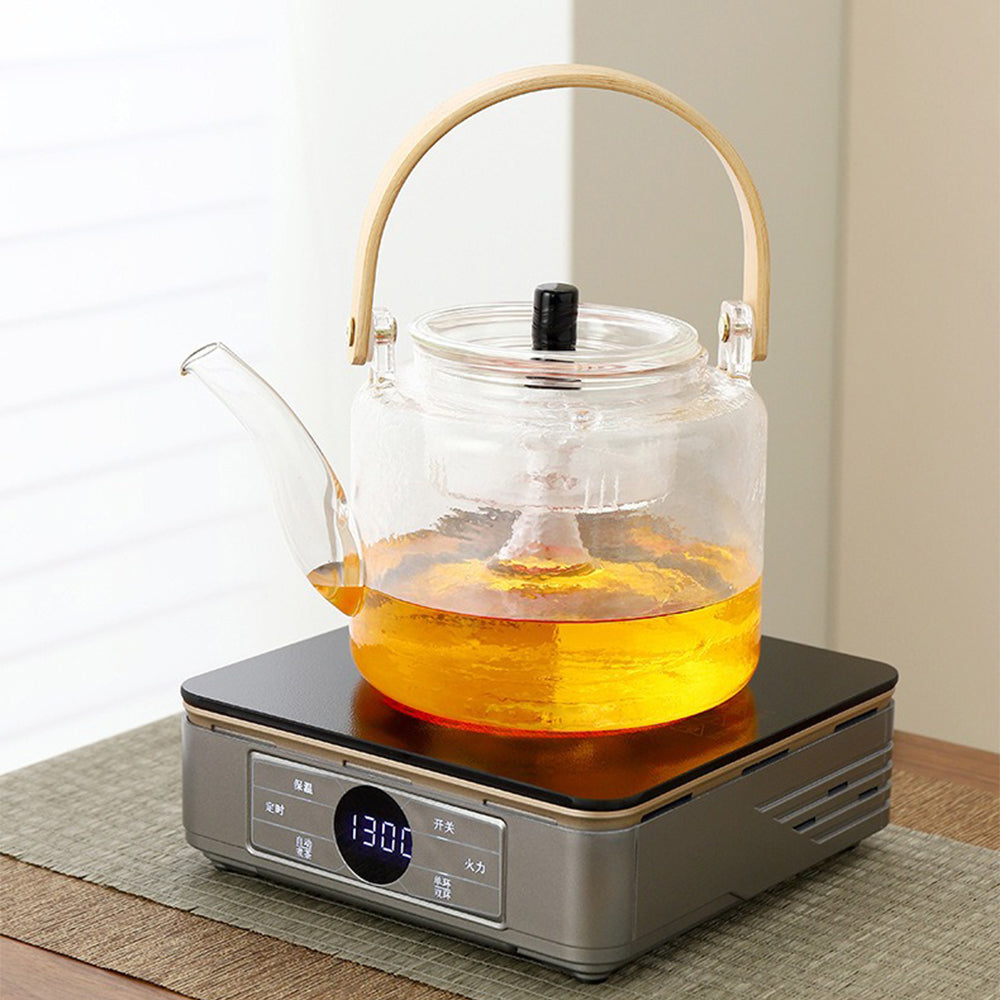 Close-up of the electric teapot heater showing adjustable temperature controls and safety features