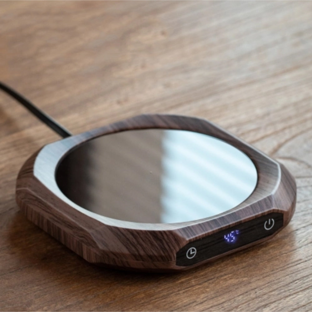 Top view of walnut teapot warmer showing touch controls and heating surface