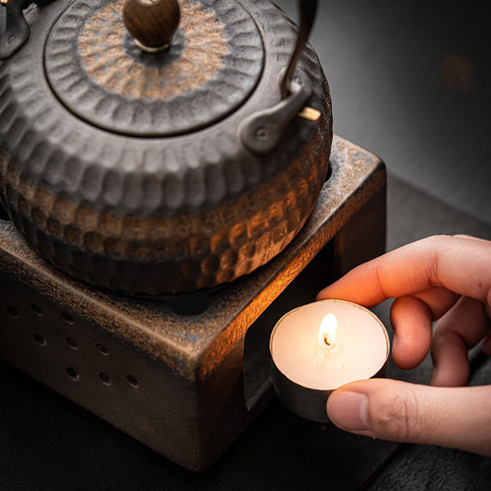 Interior view showing the heat dissipation holes and candle inside