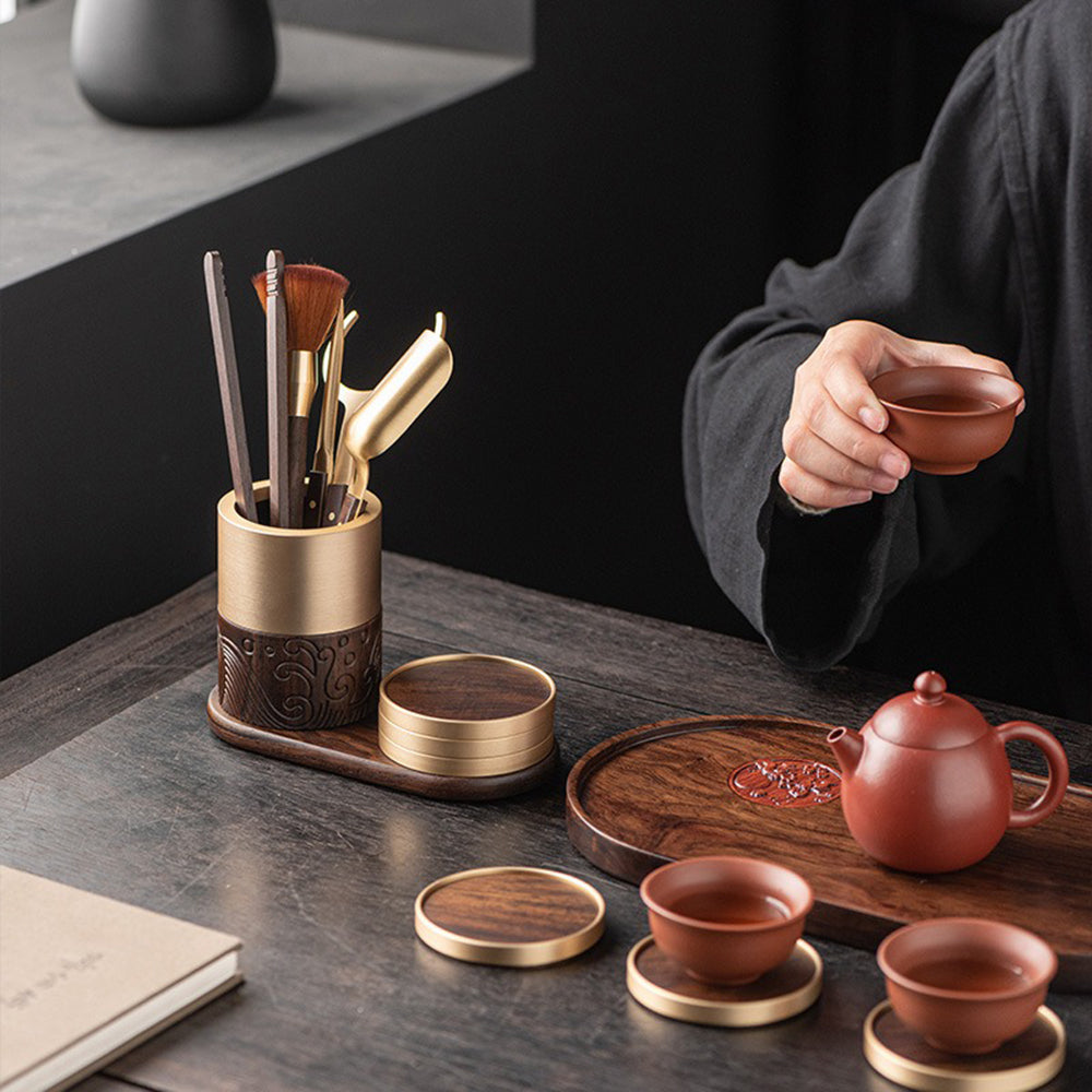 Elegant tea serving set with coasters on a tea table, ideal for traditional Chinese tea making