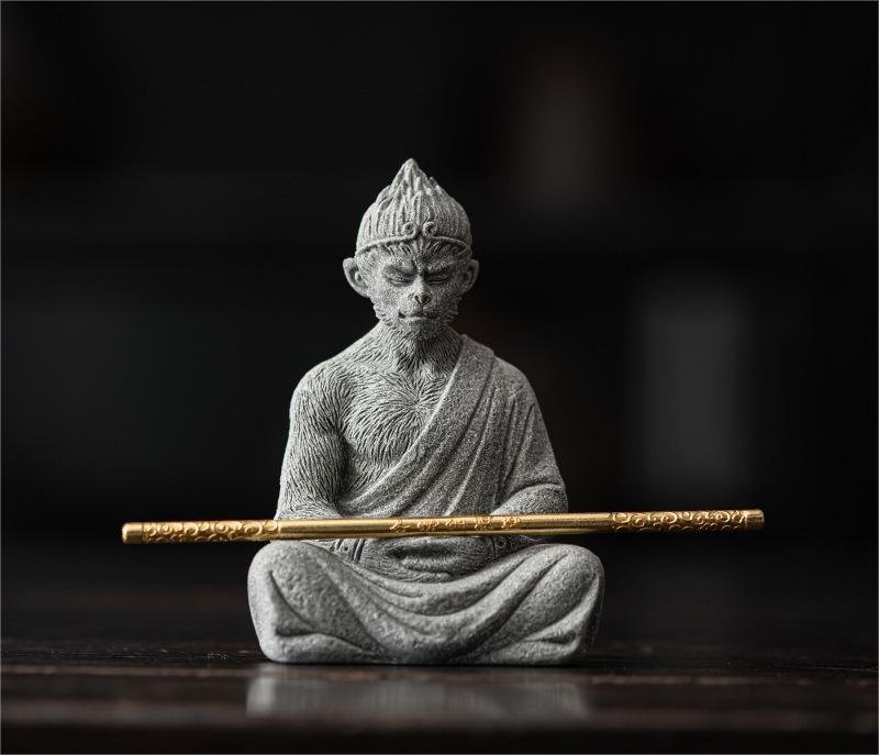 Close-up of Wukong stone tea pet showing detailed carving and sandstone texture
