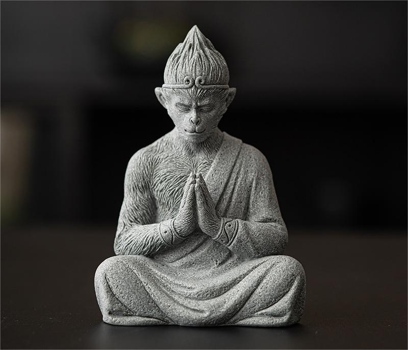 Wukong ornament placed on a tea table with traditional tea accessories