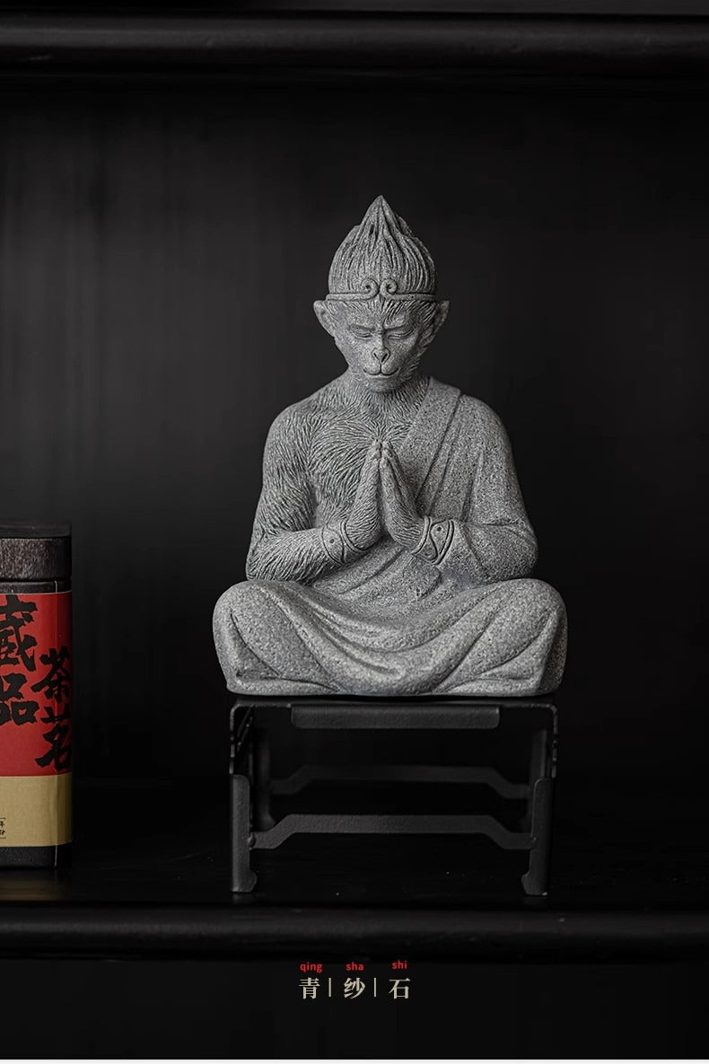 Wukong ornament placed on a tea table with traditional tea accessories