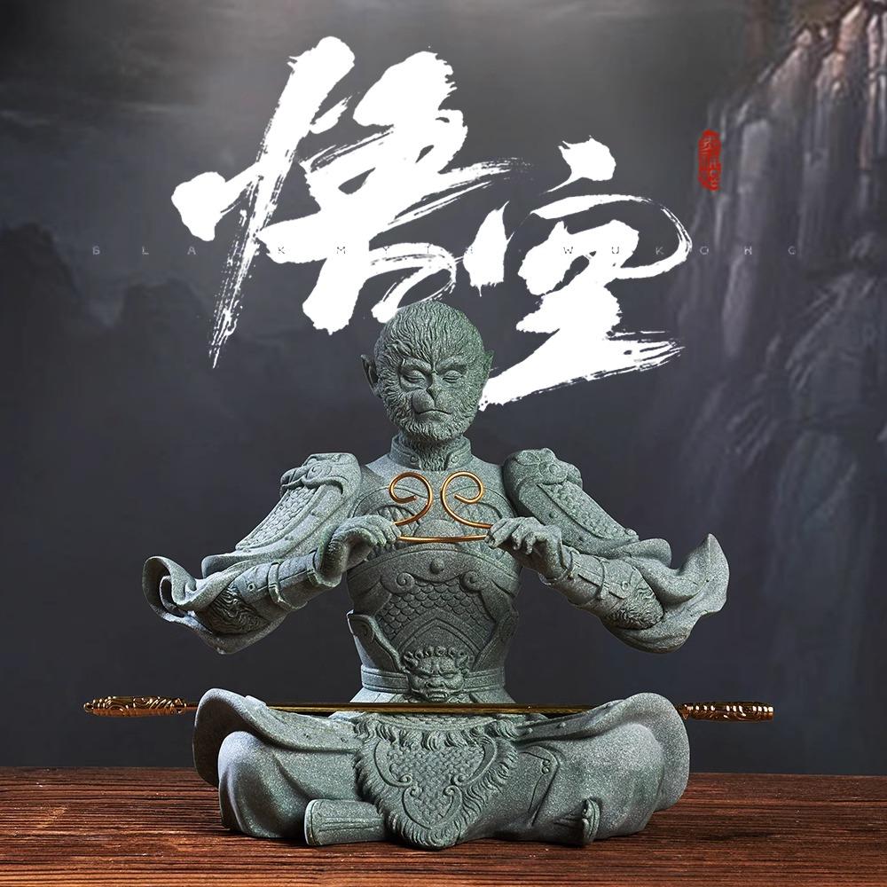 Front view of the Wukong sandstone tea pet showing detailed armor and detachable golden staff.