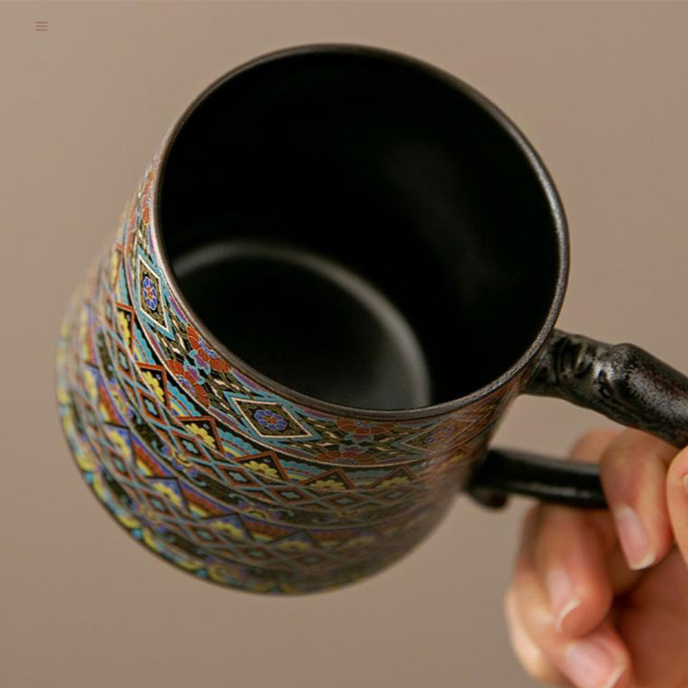 Lifestyle shot of the mug being used to brew loose leaf tea at home