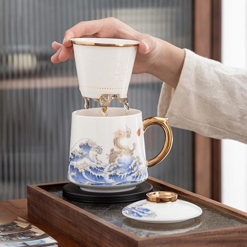 Top view of the luxury dragon tea cup with lid showing the golden strainer and sea wave design