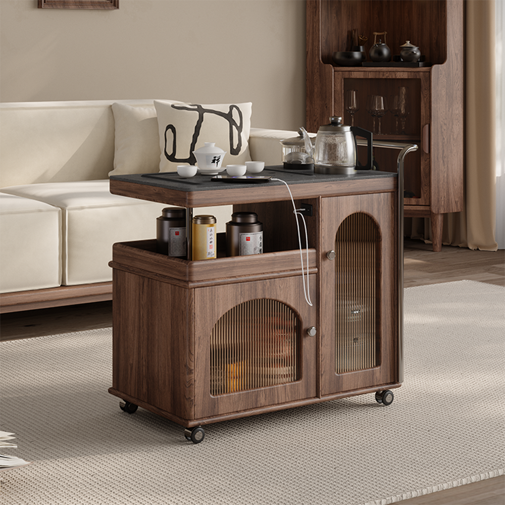 Elegant movable tea table showcasing the black stone surface and solid wood frame from a side angle.