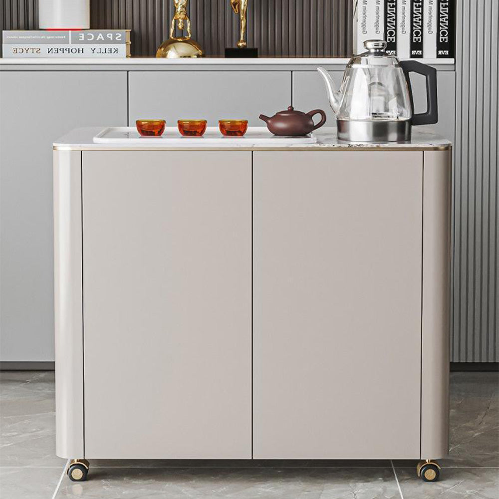Side angle of the rock slab tea table highlighting its storage space and drainage system.