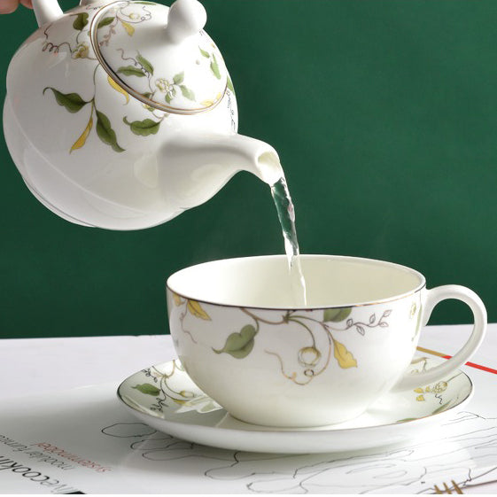 Close-up of the floral leaf bone china teapot showcasing its vibrant glaze and intricate details.
