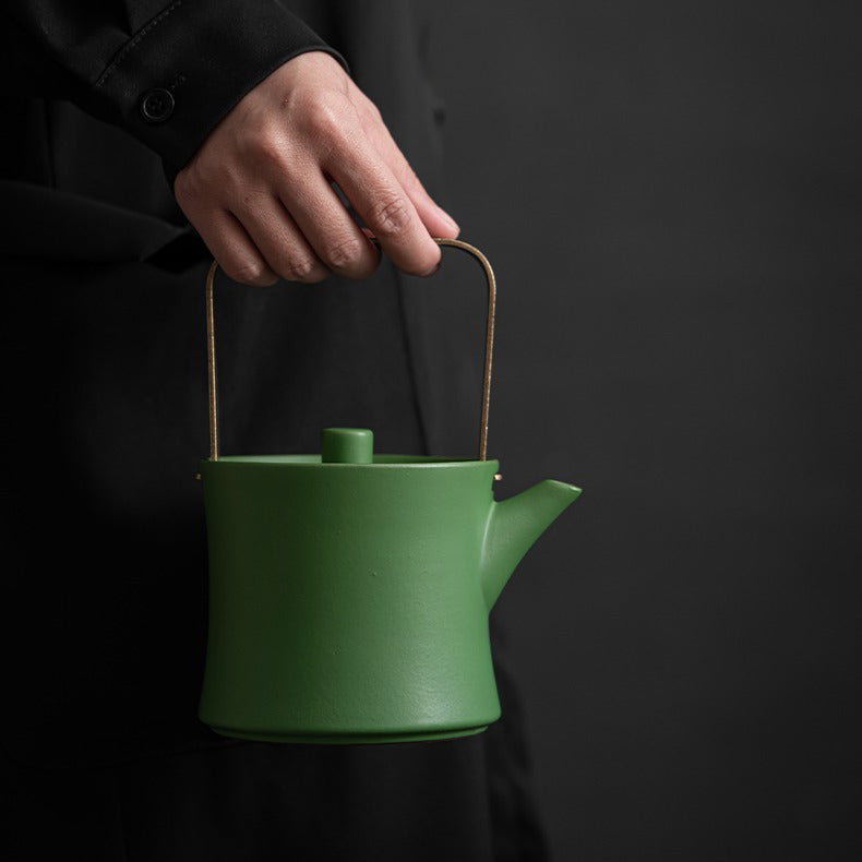 Elegant Green Bamboo Porcelain Tea Set displayed with tea cups and teapot
