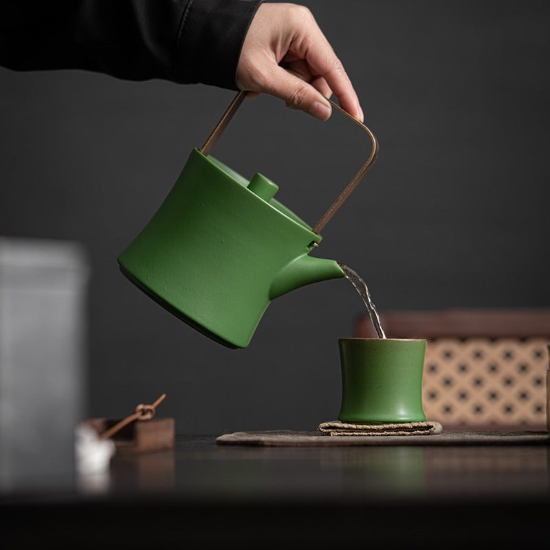 Close-up of the teapot from the Green Bamboo Porcelain Tea Set showcasing intricate design