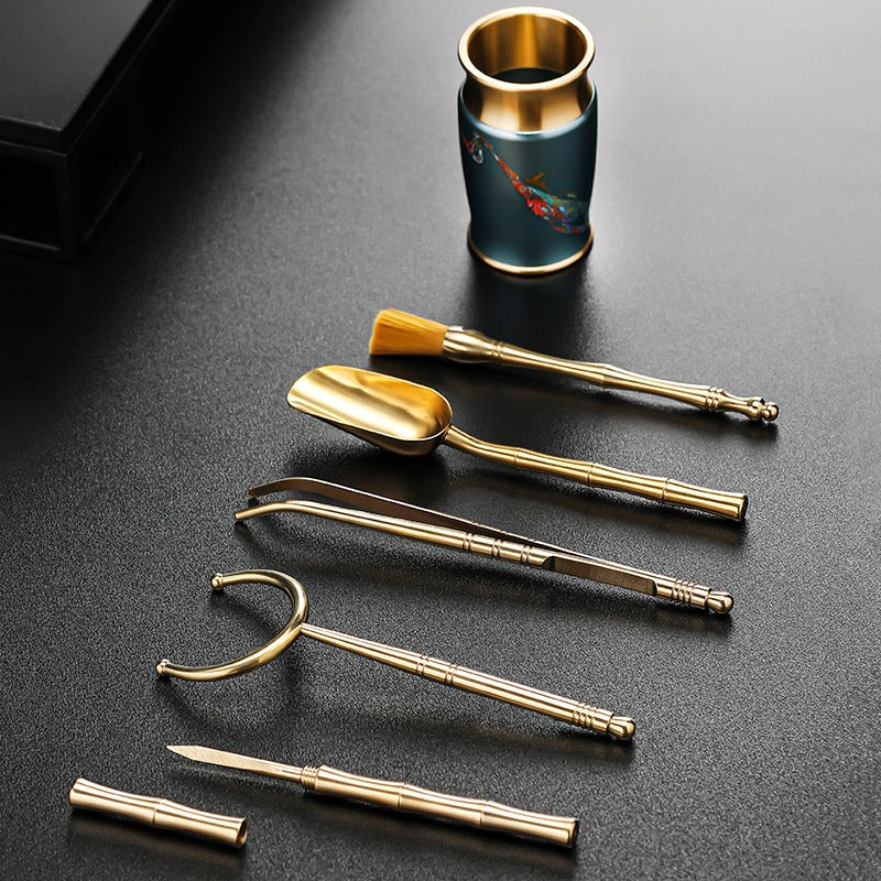 Tea utensils set in a wooden box, ready for traditional brewing