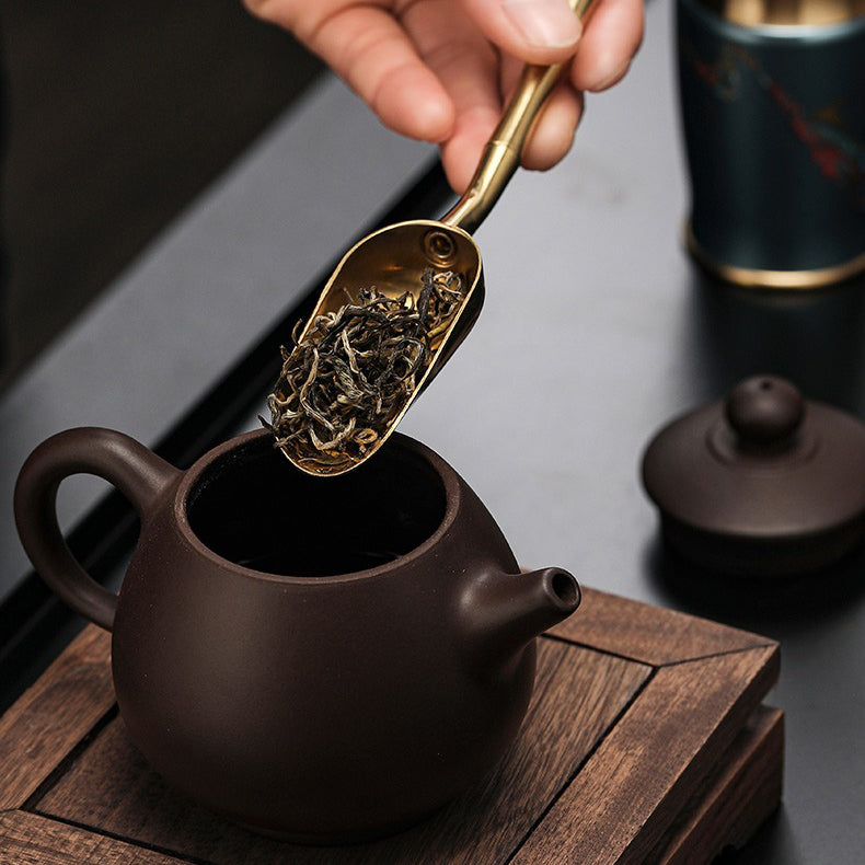 Tea utensils set in a wooden box, ready for traditional brewing