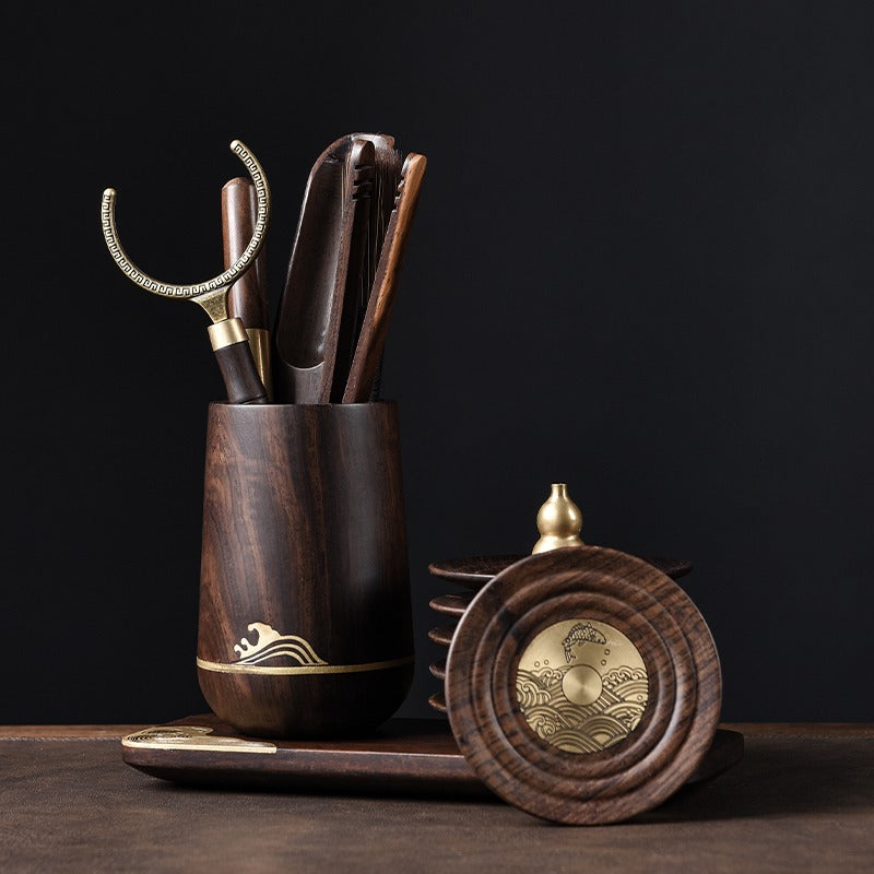 Complete Gong Fu tea set showcasing its elegant wooden container and accessories.