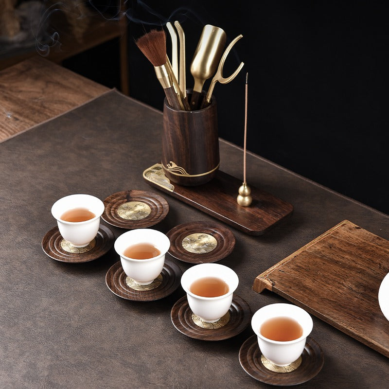 Gong Fu tea set with incense holder displayed elegantly on a wooden surface.