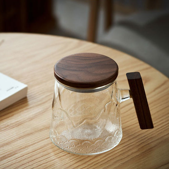 Close-up of high-quality glass tea mug showcasing brewing tea
