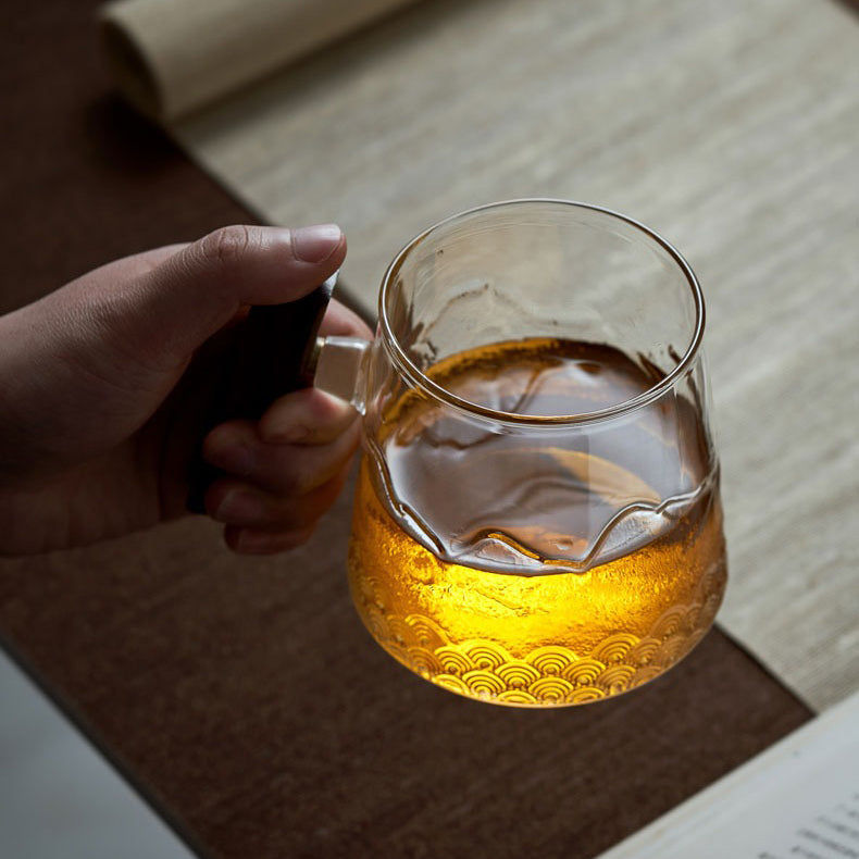 Close-up of high-quality glass tea mug showcasing brewing tea
