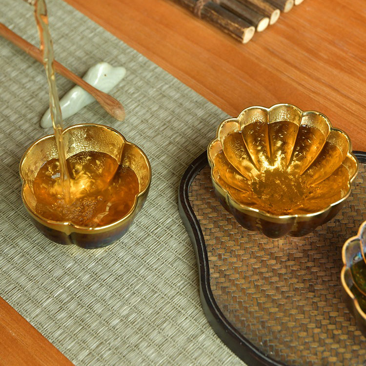 Detailed view of the gold accents on the Jian Zhan Tian Mu tea cup set, emphasizing craftsmanship.