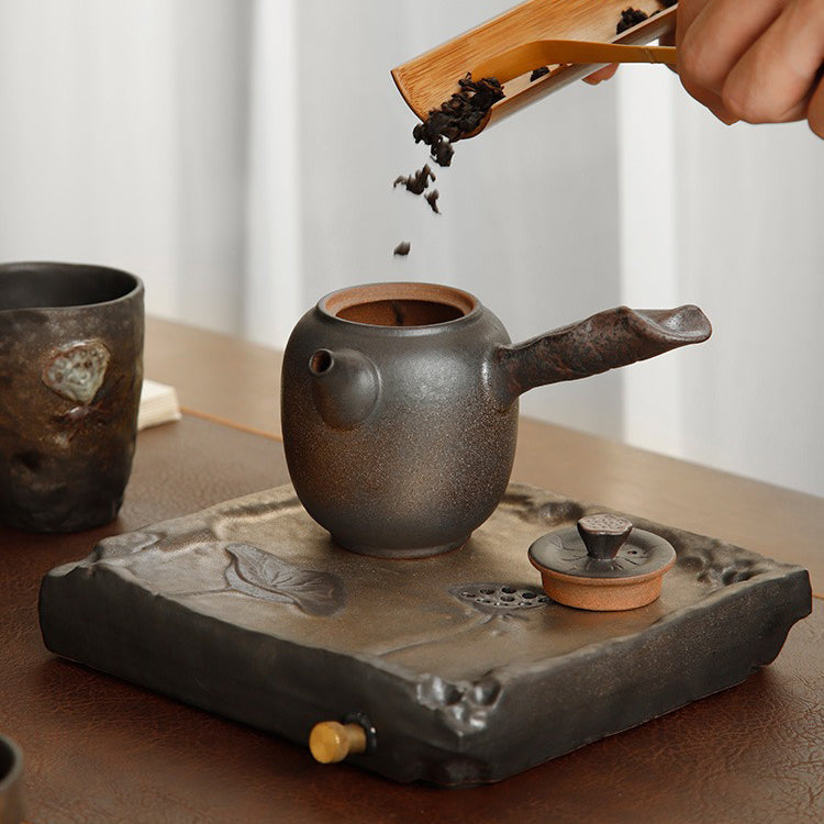 Elegant Chinese tea set with black gold accents, ideal for gifting or personal use