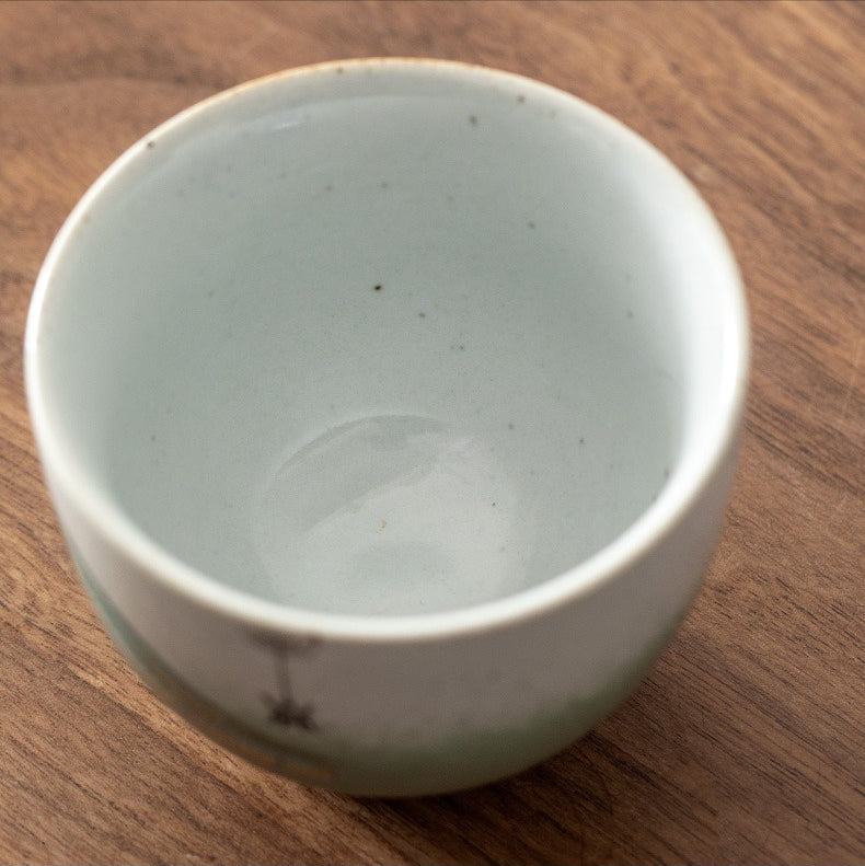 Set of 5 ceramic tea cups arranged on a wooden tray, perfect for tea ceremonies