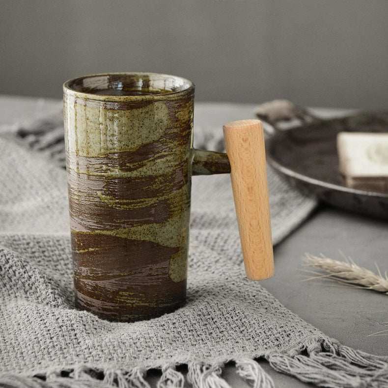 Side view of the premium vintage mug with wooden handle, highlighting its elegant design.