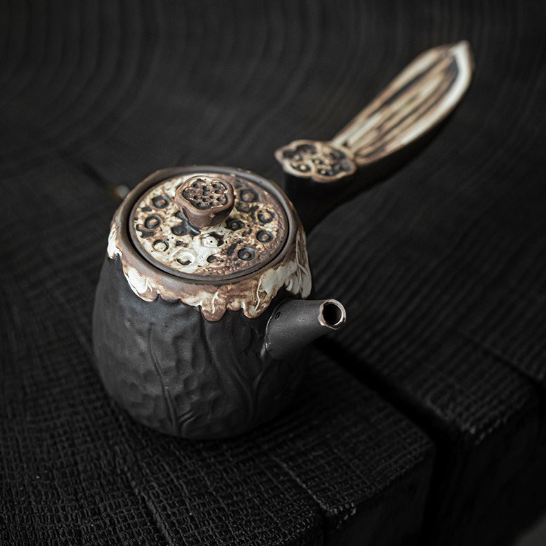Close-up of the handcrafted texture on the Wabi-Sabi lotus teapot, highlighting its unique design.