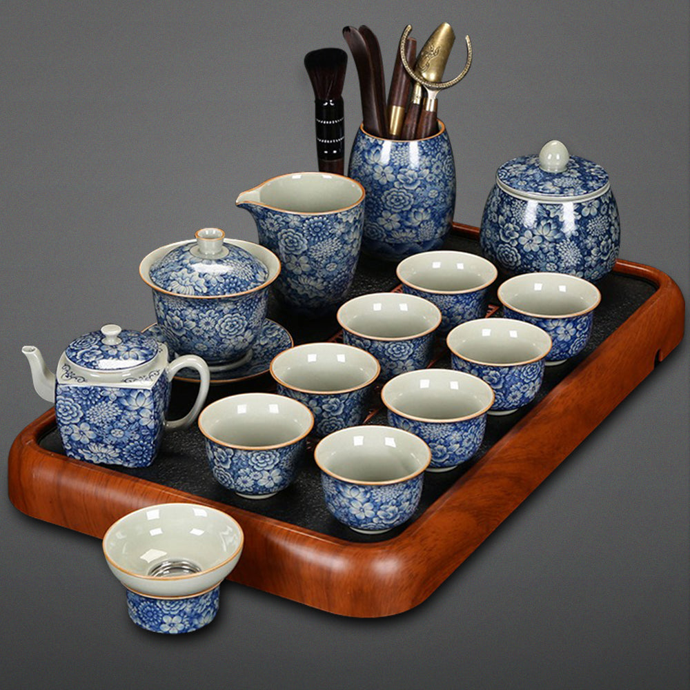 Elegant blue and white porcelain tea set displayed on a wooden table, perfect for home use.