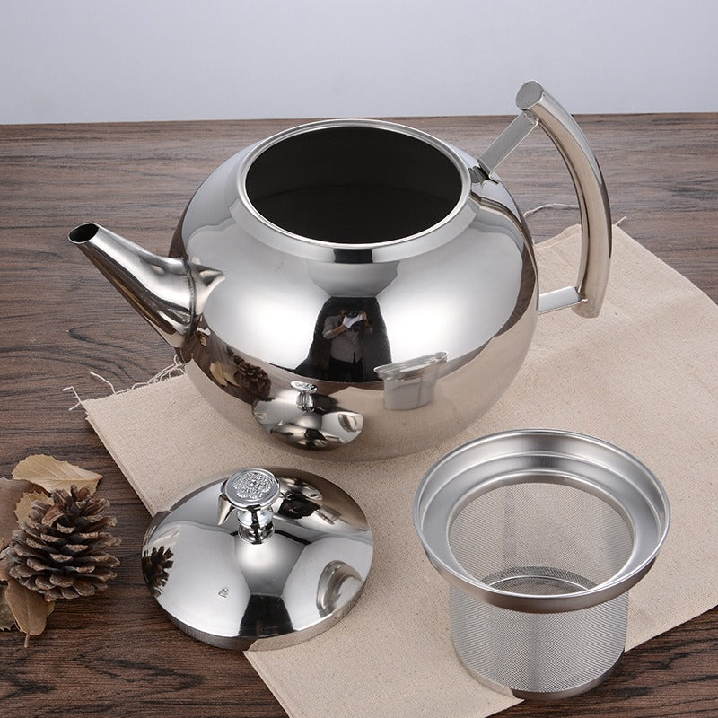 Close-up of the removable stainless steel tea strainer inside the kettle