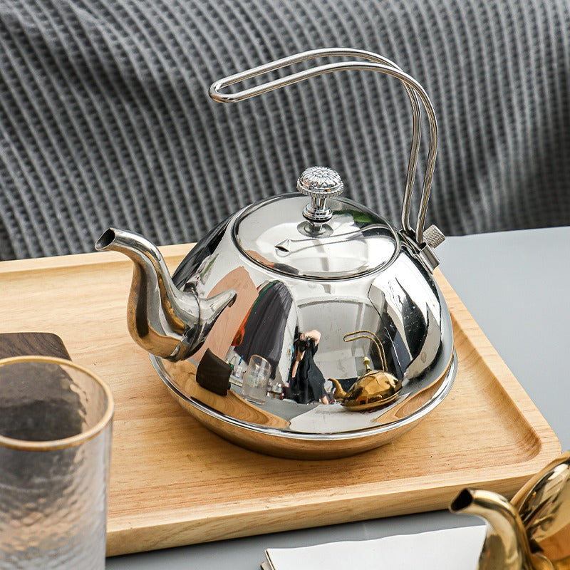 Top view of the high-end stainless steel teapot with lid and fine filter screen.