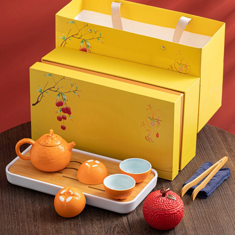 Elegant Chinese Fruit Tea Set with artistic tea tray showcasing vibrant fruit designs.